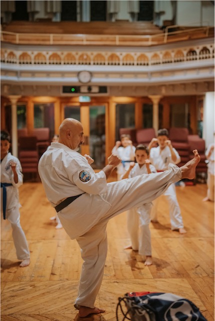 Student performing blocks during belt test